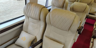 12 seater recliner seats luxury tempo traveller modification company delhi